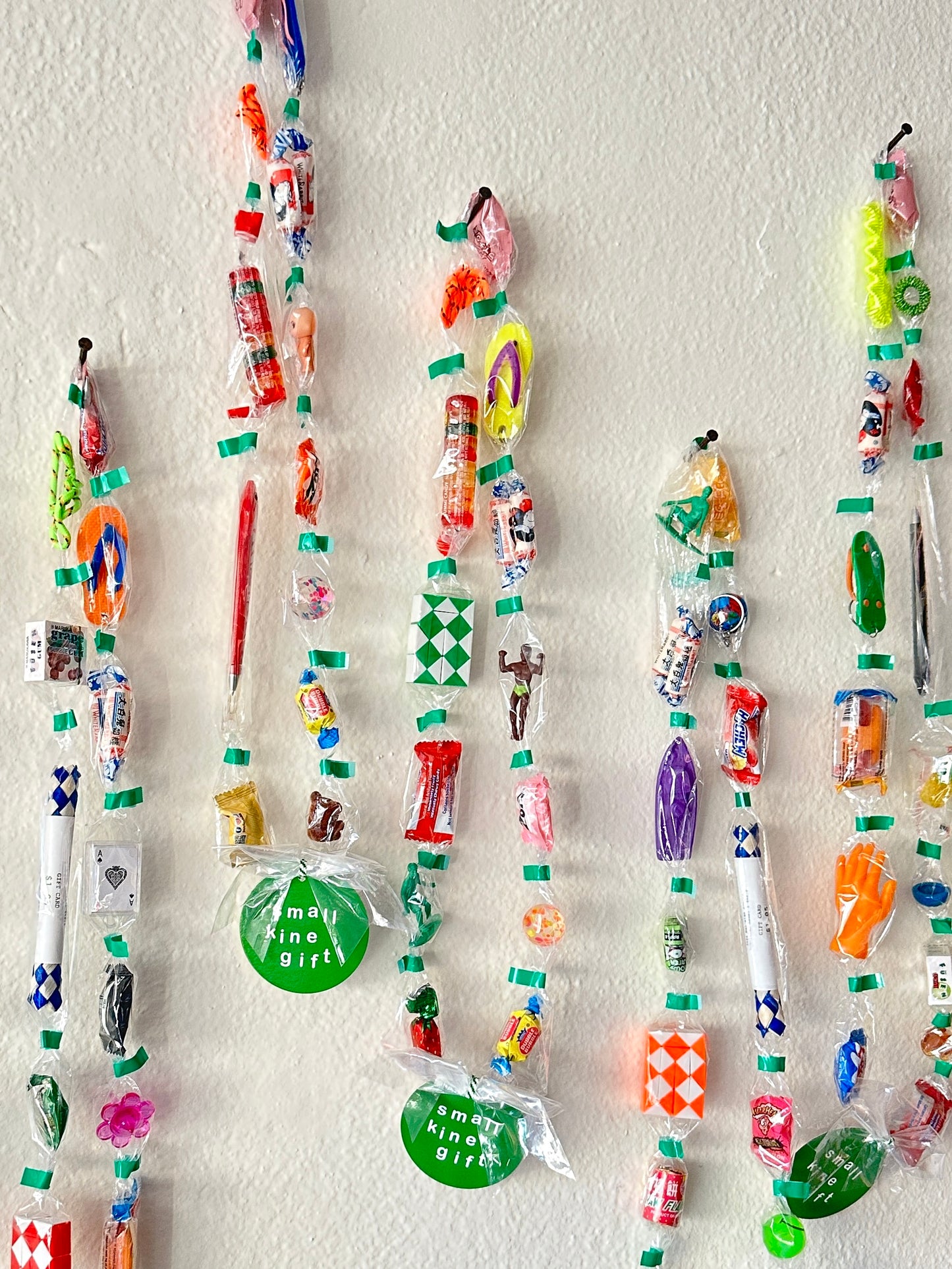 Trinket Lei necklace garland filled with colorful candy and toys and trinkets
