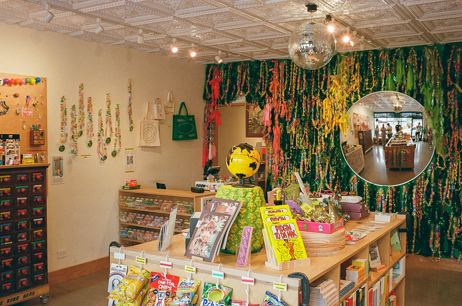 Store interior with a counter, shelves, and decorative wall